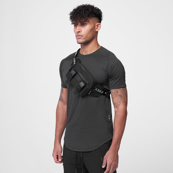 0197 Waterproof Cordura® Small Crossbody Bag in black, worn across chest on model