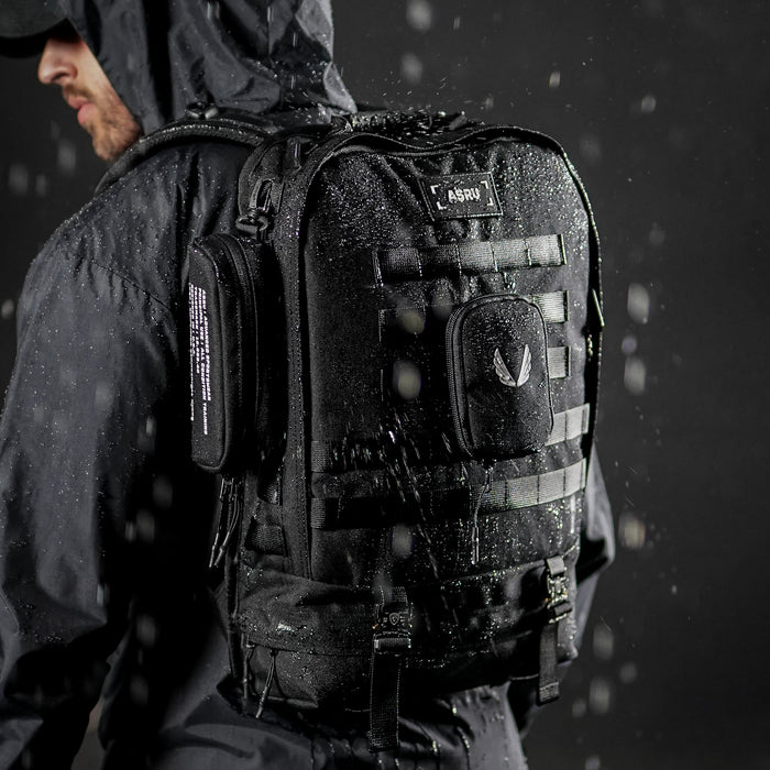 0275 Modular Everyday Pack in black, worn by model in rain