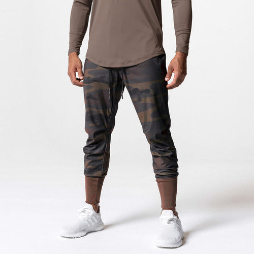 Tetra-Lite High Rib Jogger in rust camo, front view worn by model with white sneakers