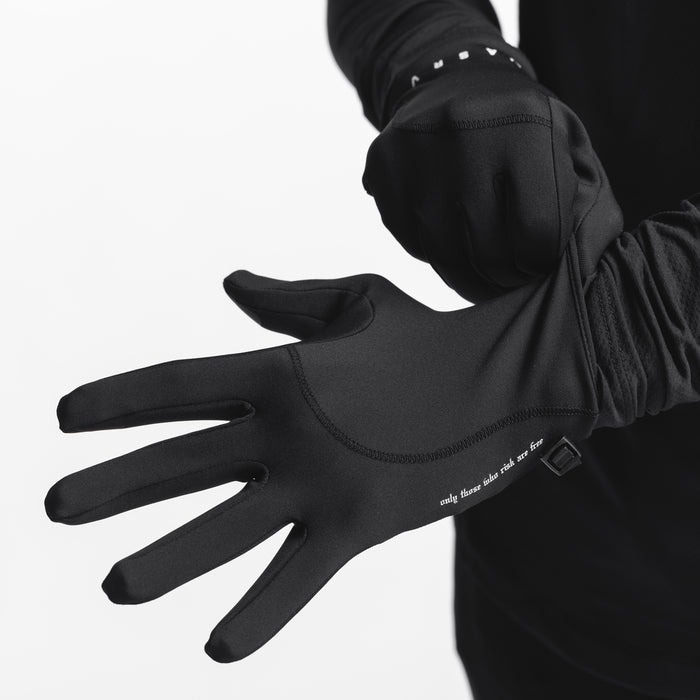 Aeroheat® Lightweight Gloves in black, worn on hands with arms extended, studded wrist detail visible