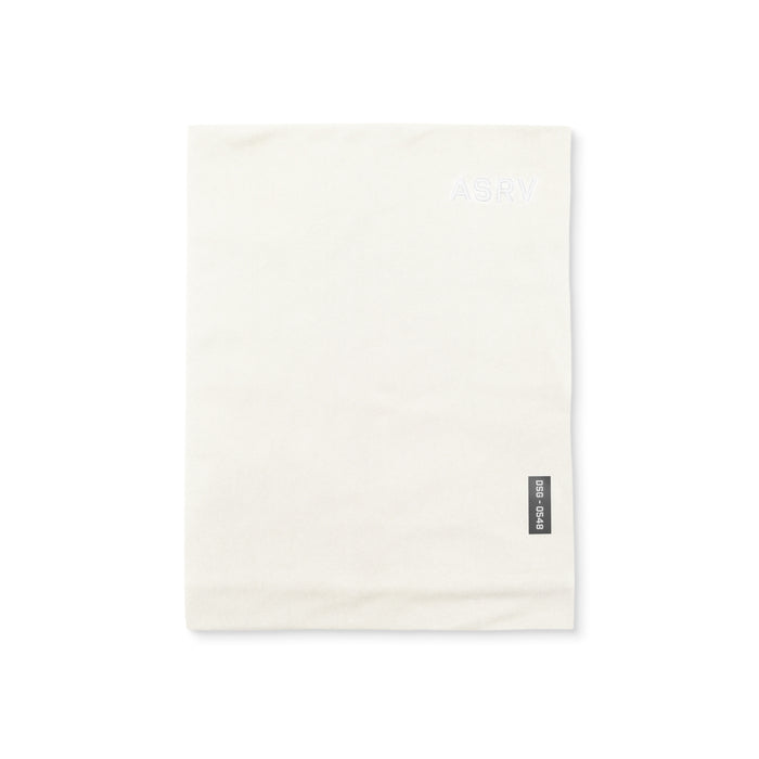flatlay of ASRV Thermal Gaiter in ivory cream, laid flat on white surface