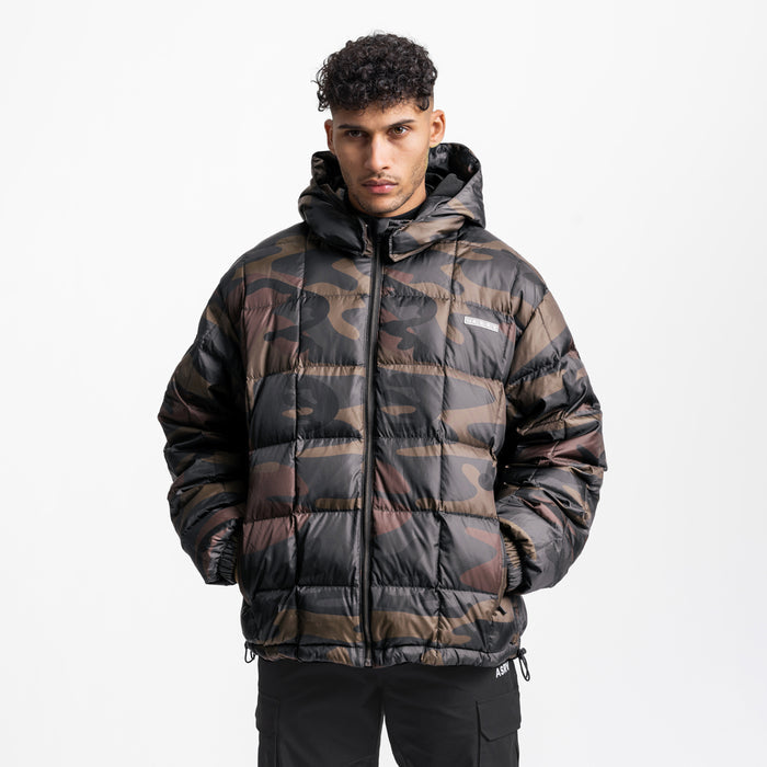 Weather-Ready Down Puffer Jacket in rust camo, worn by model, front view