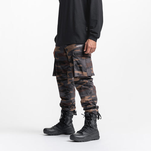 Weather-Ready Technical Cargo Pant in rust camo, worn with black boots, side view