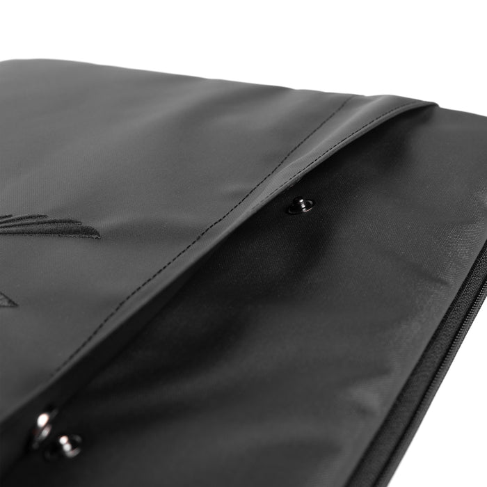Water resistant padded laptop case in black, detail closeup of zipper and fabric
