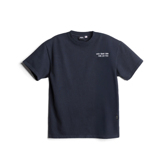 flatlay 0576. LE Cotton Tee in navy with 'only those who risk are free' chest text