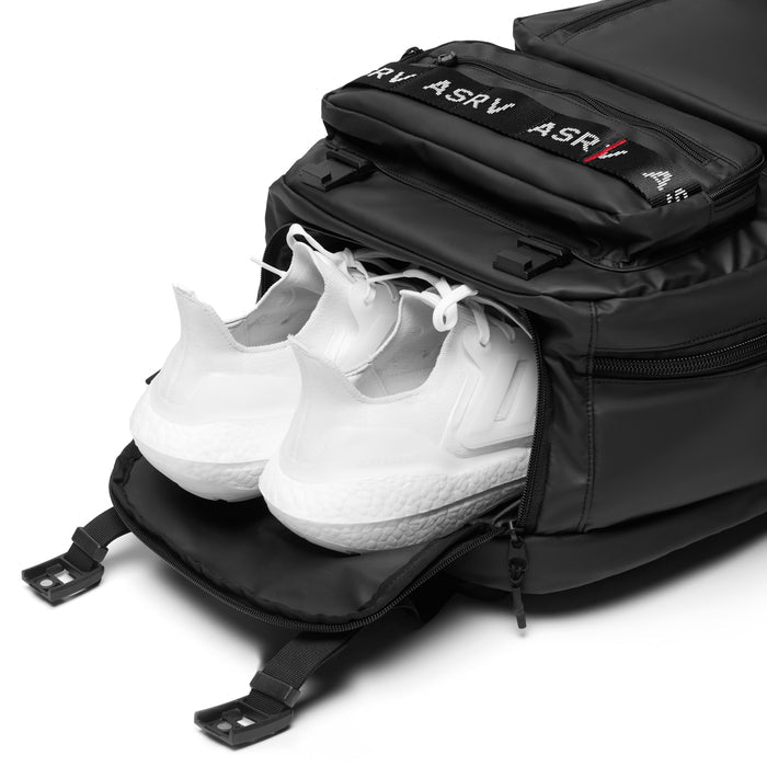 Flatlay ASRV 0580 waterproof large travel backpack in black with white sneakers