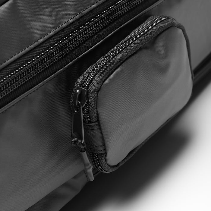 Flatlay Waterproof Large Travel Backpack in black, zipper detail closeup