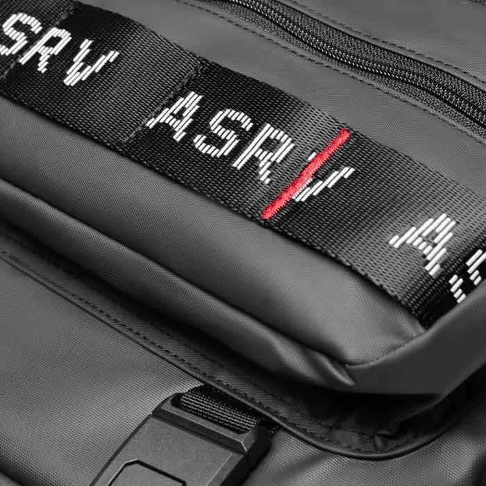 Flatlay Waterproof Large Travel Backpack in black, detail view of straps and zipper