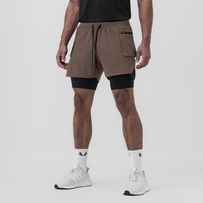 Tetra-Lite Liner Cargo Short in deep taupe worn with black compression shorts, front view