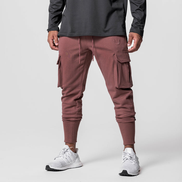 Tech-Terry Cargo High Rib Jogger in Red Earth, modeled with white sneakers