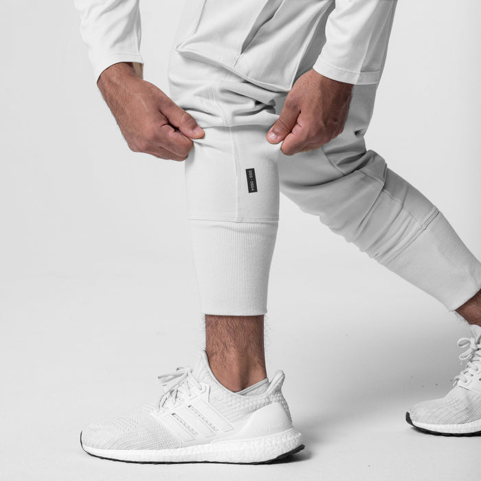Tech-Terry Cargo High Rib Jogger in white, worn by model with white sneakers, front view