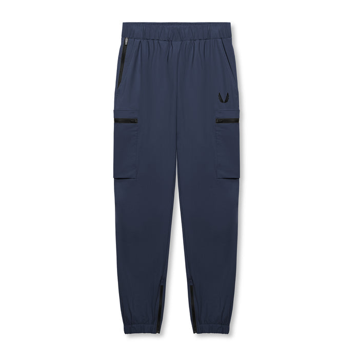 flatlay Tetra-Lite Standard Zip Jogger in navy, front view