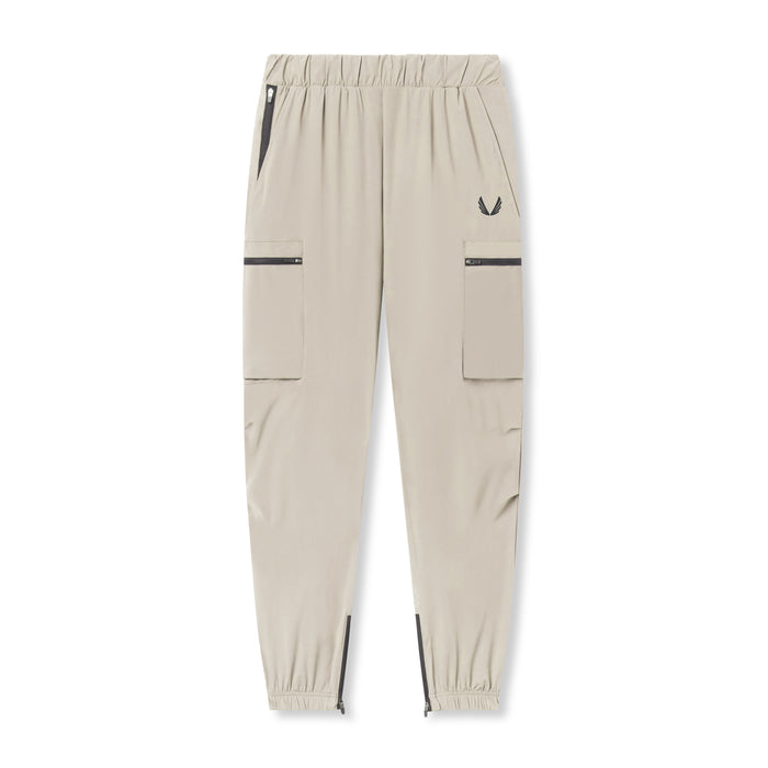 flatlay Tetra-Lite Standard Zip Jogger in sand smoke, front view