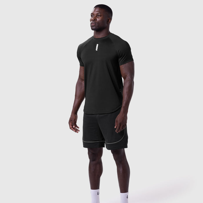 AeroSilver Established Tee in black worn with black shorts, front view on model