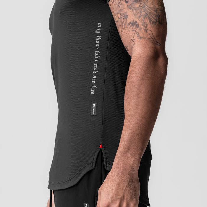 Black AeroSilver Established Tee worn by model, side view showing graphic text and design