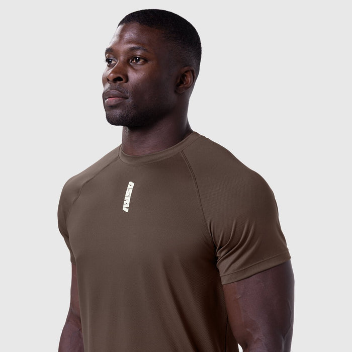 AeroSilver Established Tee in dark earth, worn by model in profile view