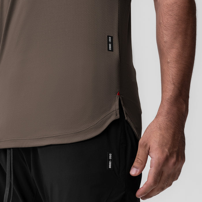 AeroSilver Established Tee in deep taupe worn by model, side view detail