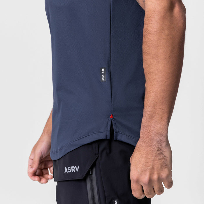 AeroSilver Established Tee in navy worn by model, side detail view showing box logo