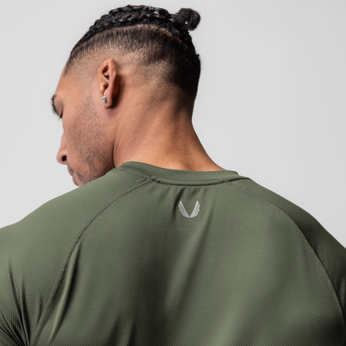 AeroSilver Established Tee in olive worn by model, back view