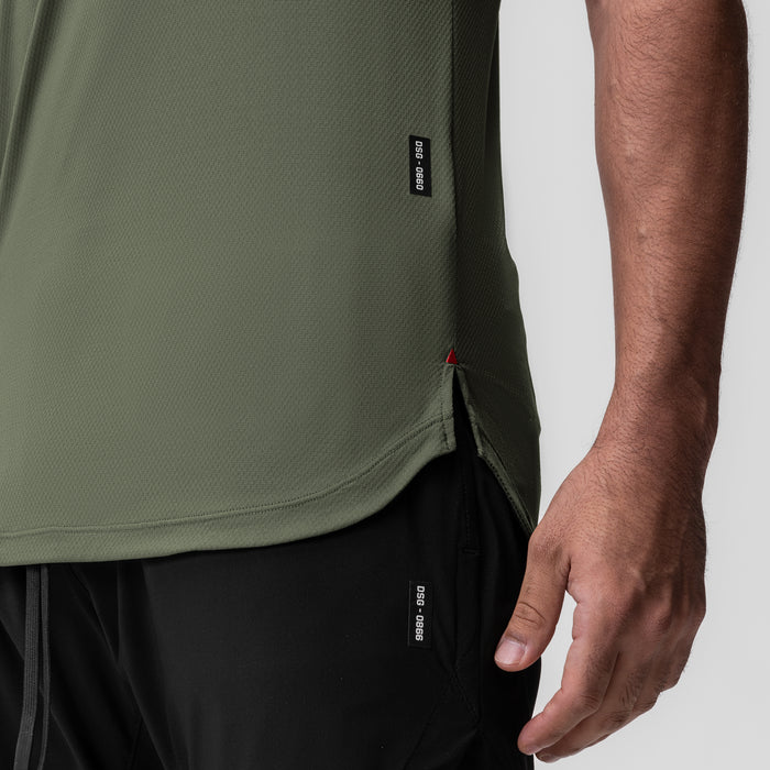 AeroSilver Established Tee in olive worn by model, side detail view
