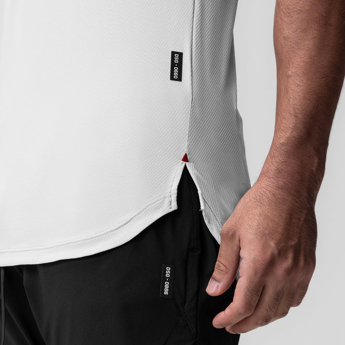 White AeroSilver Established Tee worn by model, side detail view showing fabric texture