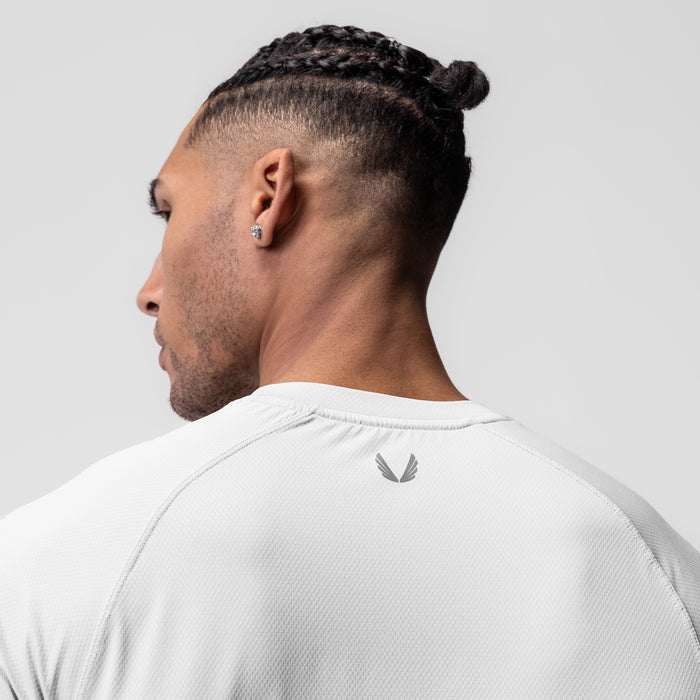 AeroSilver Established Tee in white, worn by model shown from behind