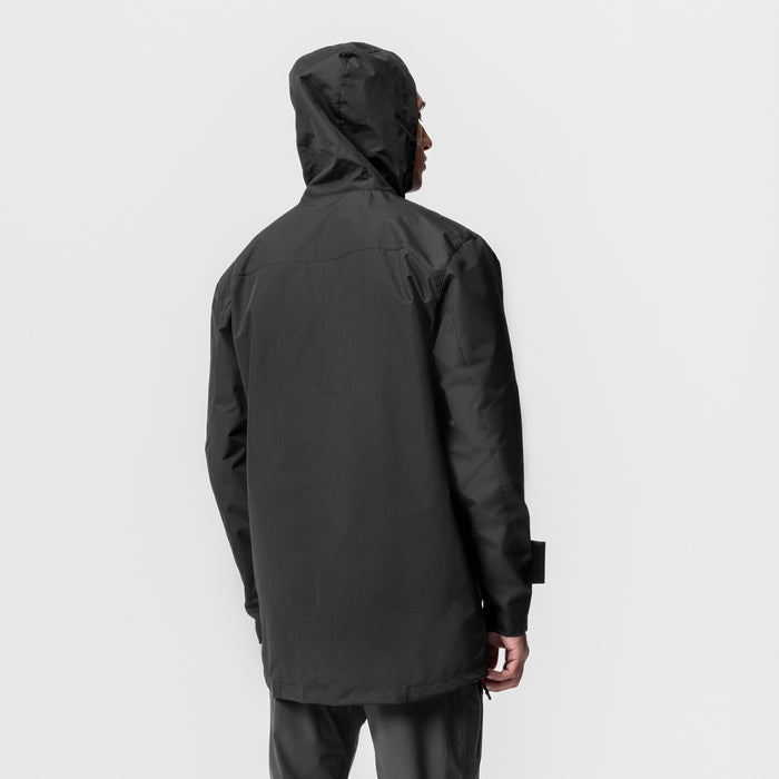 Black Hipora® Tech Parka worn by model, rear view