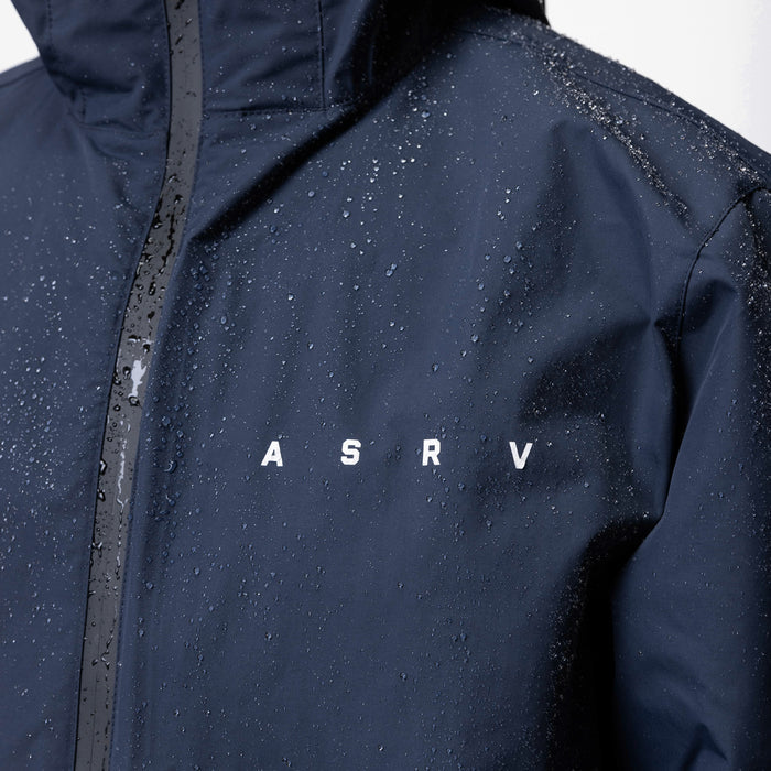 Hipora® Tech Parka in navy with water beads, worn on model, front view