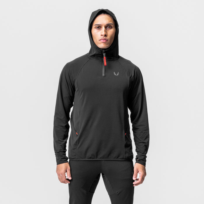 Black training hoodie with hood up, worn by male model standing against white background