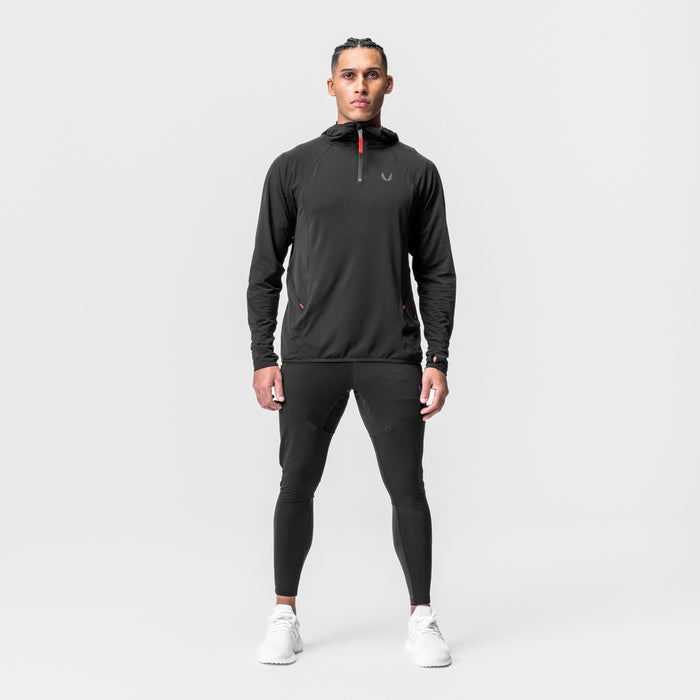Black Training Hoodie worn by male model with matching black leggings, front view