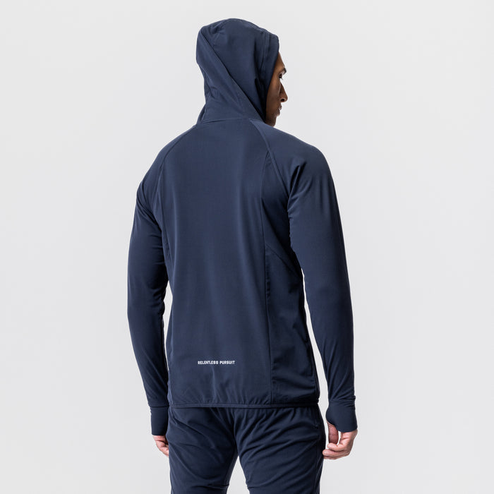 Navy training hoodie on model, back view with hood up