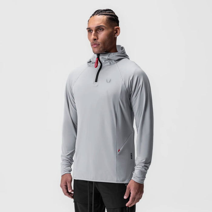 Training hoodie in slate grey worn by model, front view