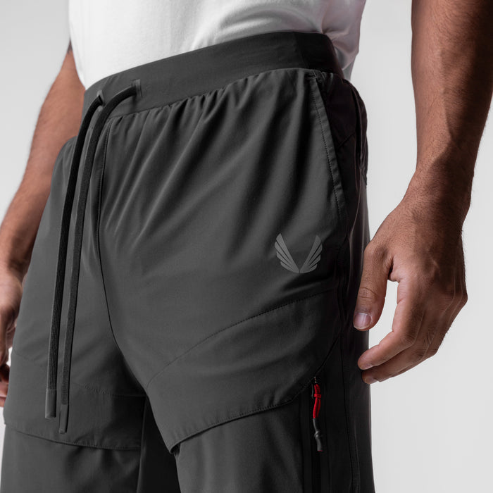 Tetra-Lite Tech High Rib Jogger in space grey, worn by model, side view