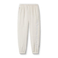 flatlay of Sherpa Recovery Sweats joggers in ivory cream, front view