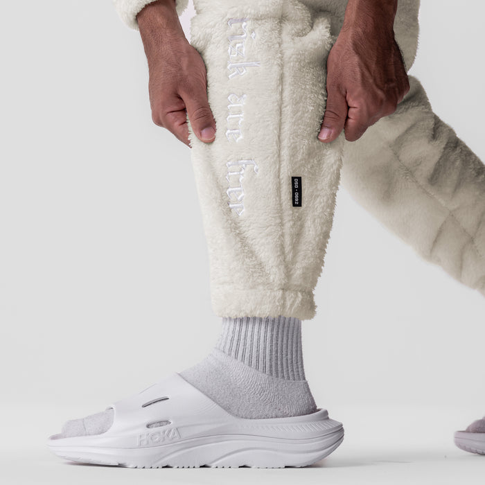 Sherpa Recovery Sweats in Ivory Cream worn by model, detail view of leg and foot