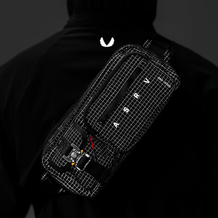 0703 Cordura Tech Crossbody Pack in Black Grid, worn on model's back