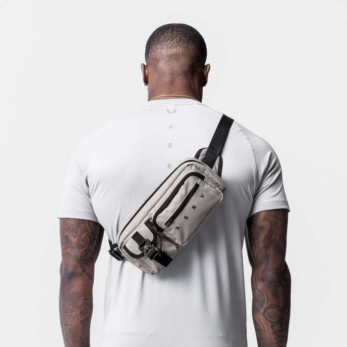 Cordura® Tech Crossbody Pack in Chai, worn across back