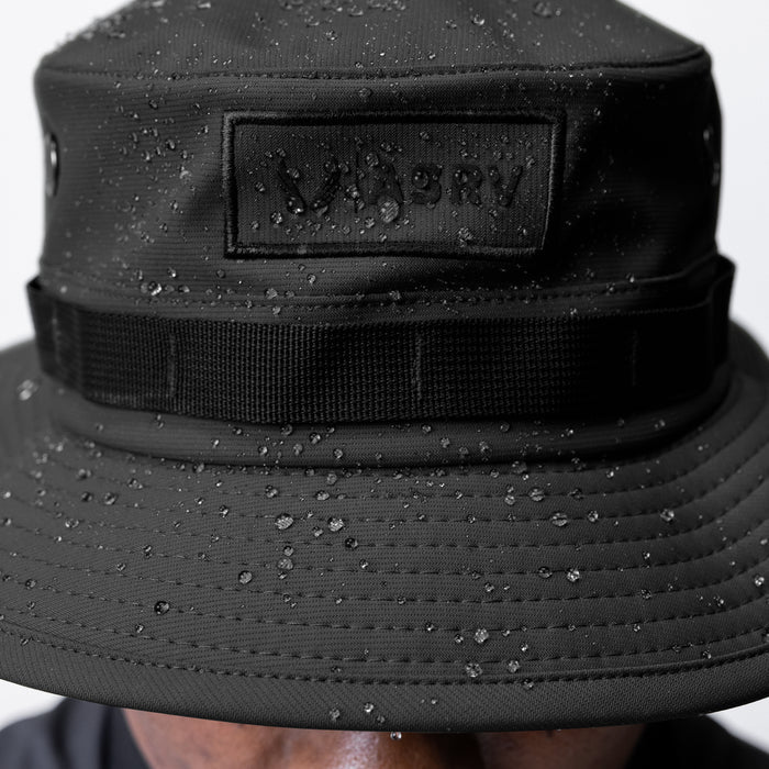 Waterproof Vented Boonie Hat in black, worn on model