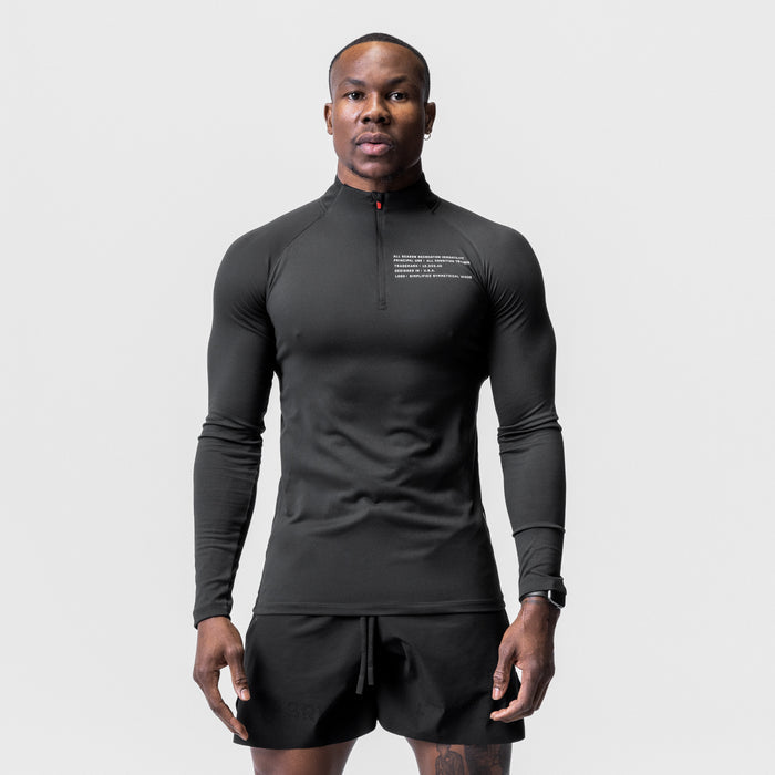 Core Fitted Quarter Zip in black worn by male model, front view