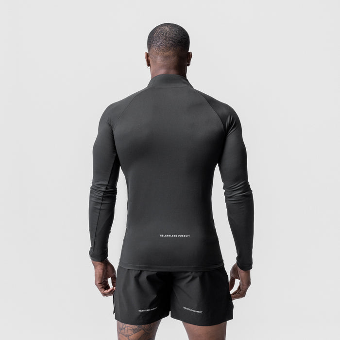 Core Fitted Quarter Zip in black, back view on model