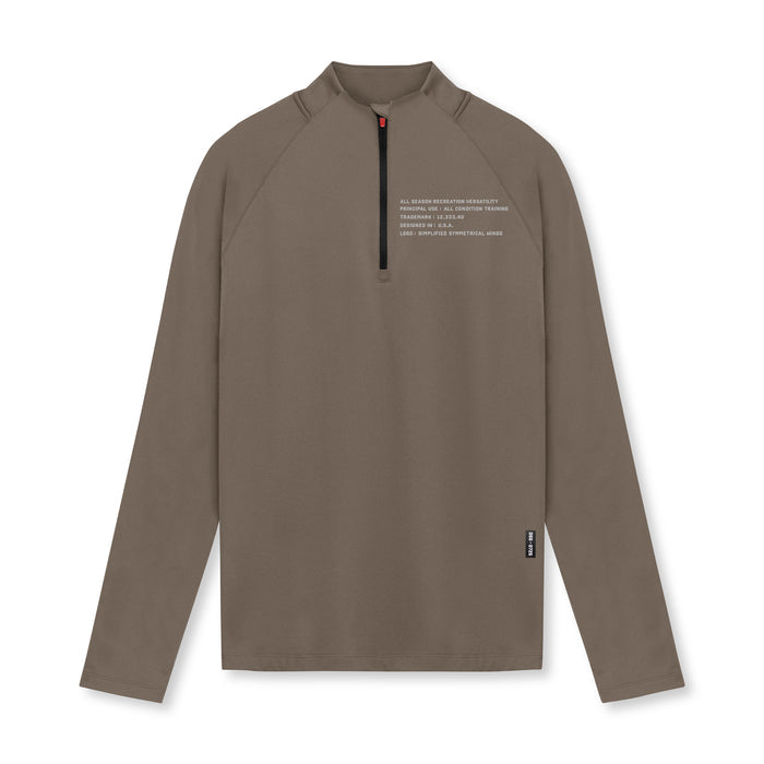 flatlay Core Fitted Quarter Zip in deep taupe, front view