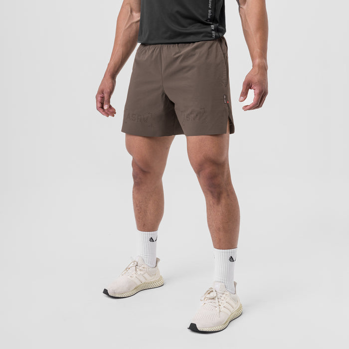 Ripstop 6" Perforated Short in Deep Taupe, modeled with white socks and cream sneakers