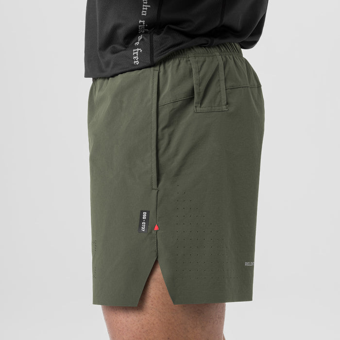 Ripstop 6" Perforated Short in olive worn by model, side view
