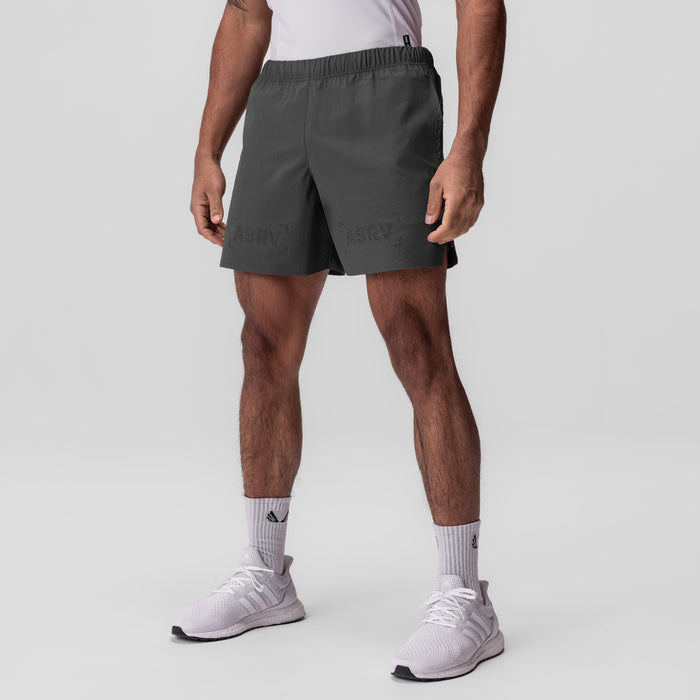Ripstop 6" Perforated Short in space grey worn by model with white socks and sneakers