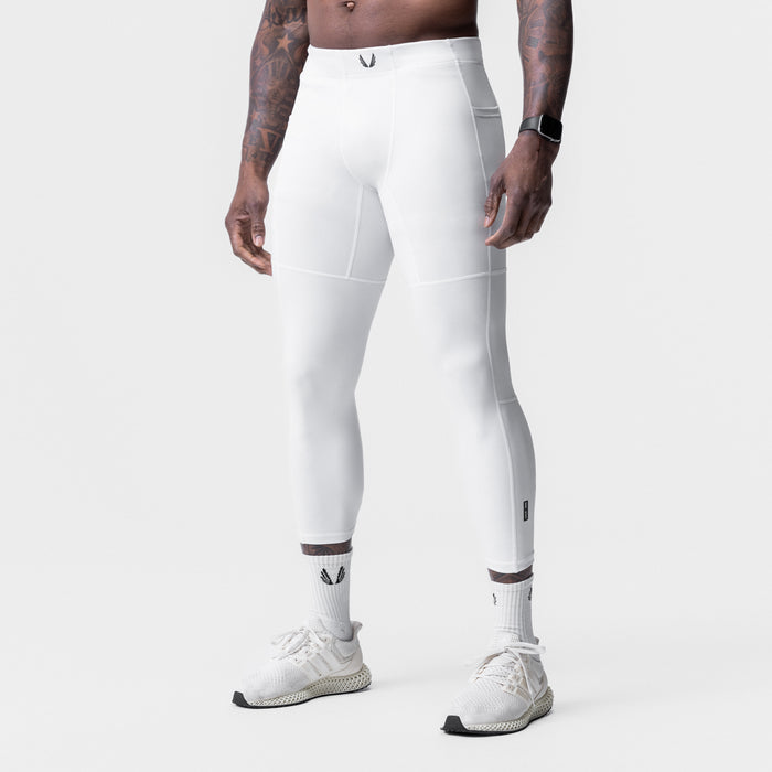 White WarpFlexx Side Pocket 3/4-Length Legging worn by model, side view
