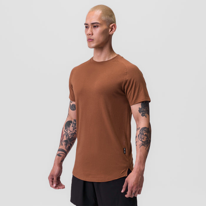 Supima® Established Tee in rust, worn by model with arms at sides, front view