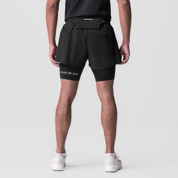 Ripstop 3" Belt Pack Short in black, back view on model with white sneakers