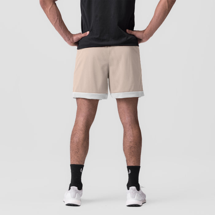SilverPlus™ Mesh Reversible Short in beige/white, back view on model
