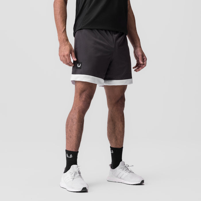 SilverPlus Mesh Reversible Short in Raven/White, modeled from front