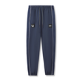 flatlay Ripstop Oversized Track Pant in navy with white piping, front view